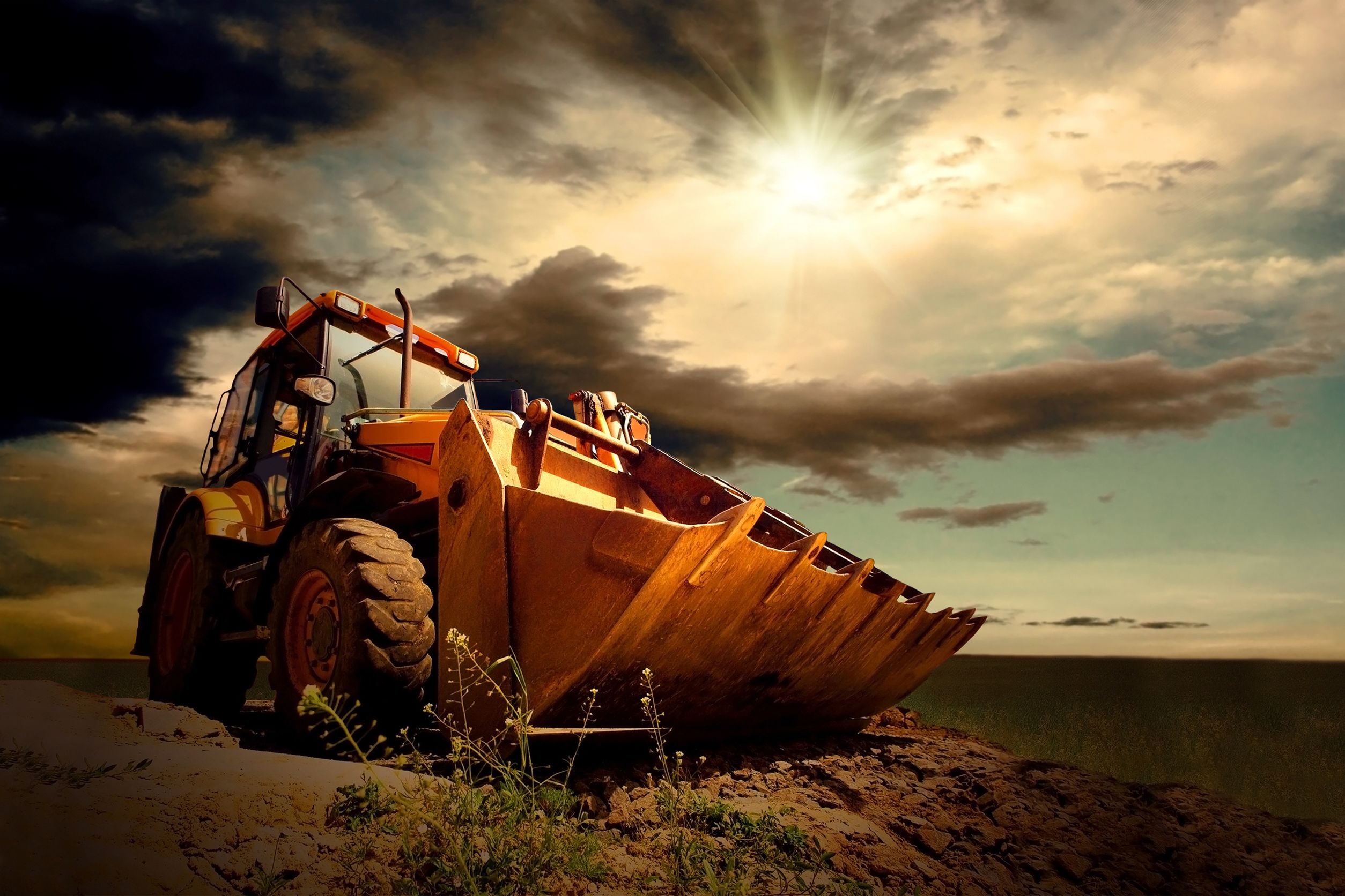 20215922 - yellow tractor on sky background
